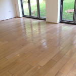 Solid wood floor tiles laid