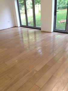 Solid wood floor tiles laid